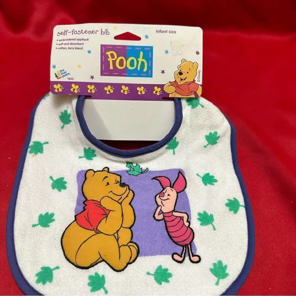 The first Years Pooh bib infant